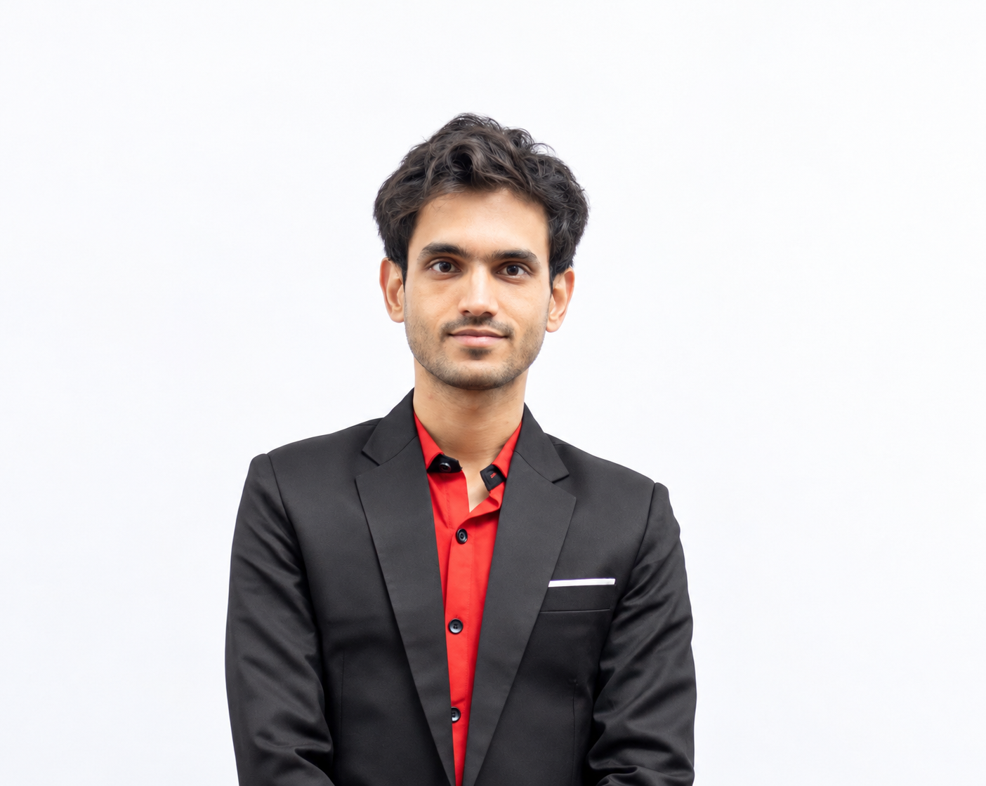 Dr. Mayur Ghate in a black blazer and red shirt